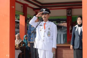 “Peringatan HUT ke-80 RI: Desa Kesugihan Gelar Upacara Pengibaran dan Penurunan Bendera Secara Khidmat”
